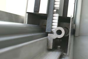 Ajuste protector de la puerta en un sistema de lavado