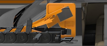 Cadena portacables junto a neumáticos de vehículos