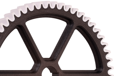 Fabricación aditiva de dos componentes