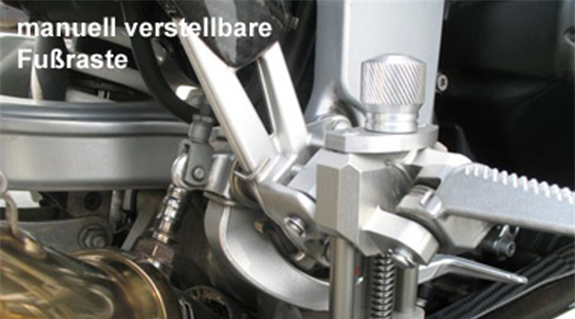 Adjustable biker's foot rest on motorbike